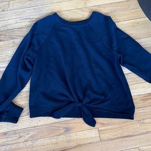 Black crewneck with tie at bottom